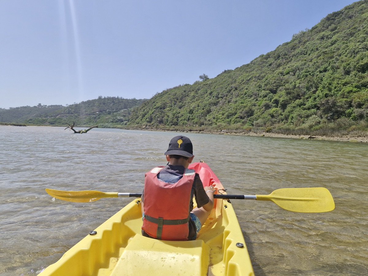 Family kayaking on a Portuguese lagoon